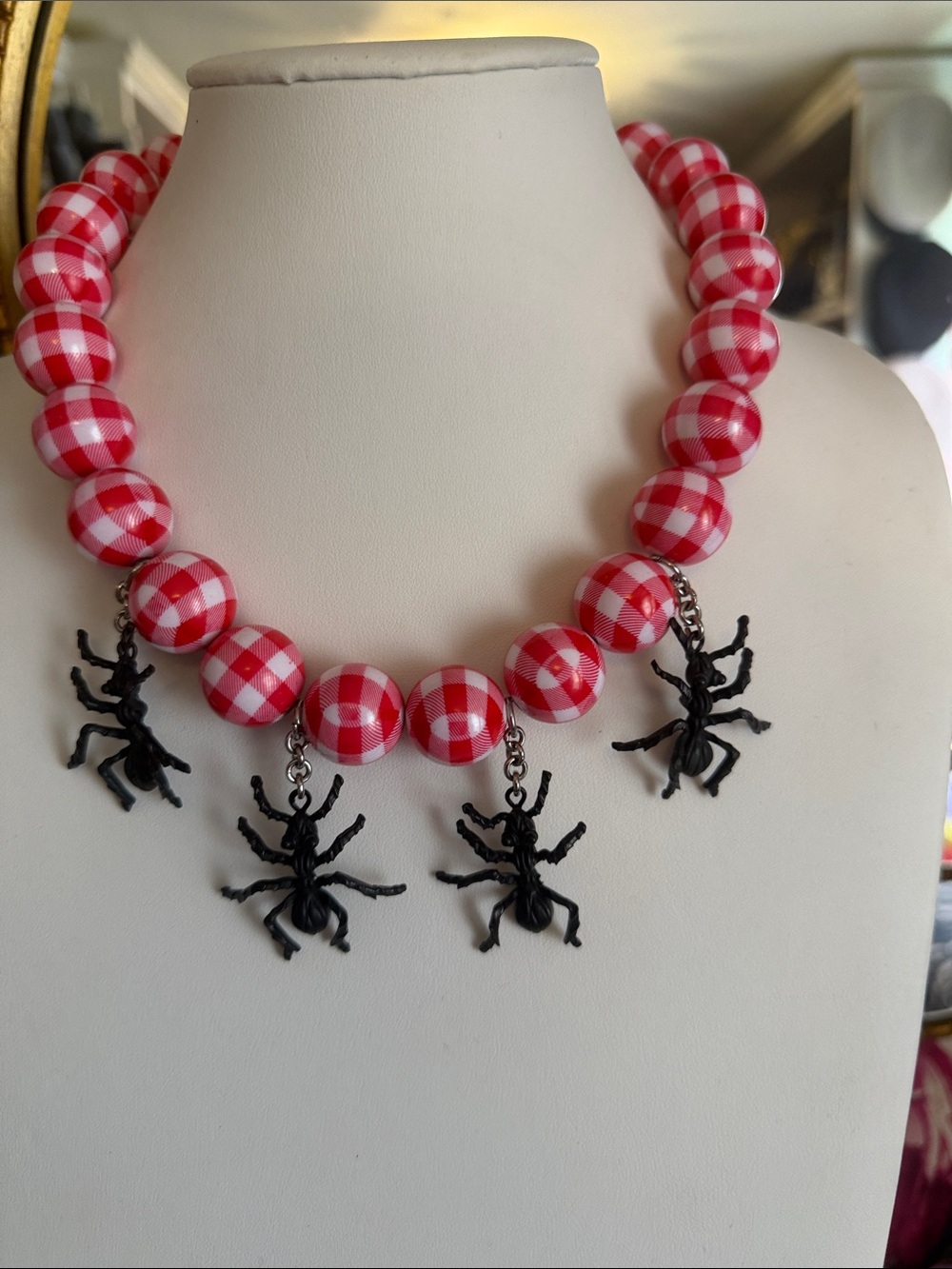 The Audrey Limoges Collection Red Gingham Bead Necklace with Black Spider Charms